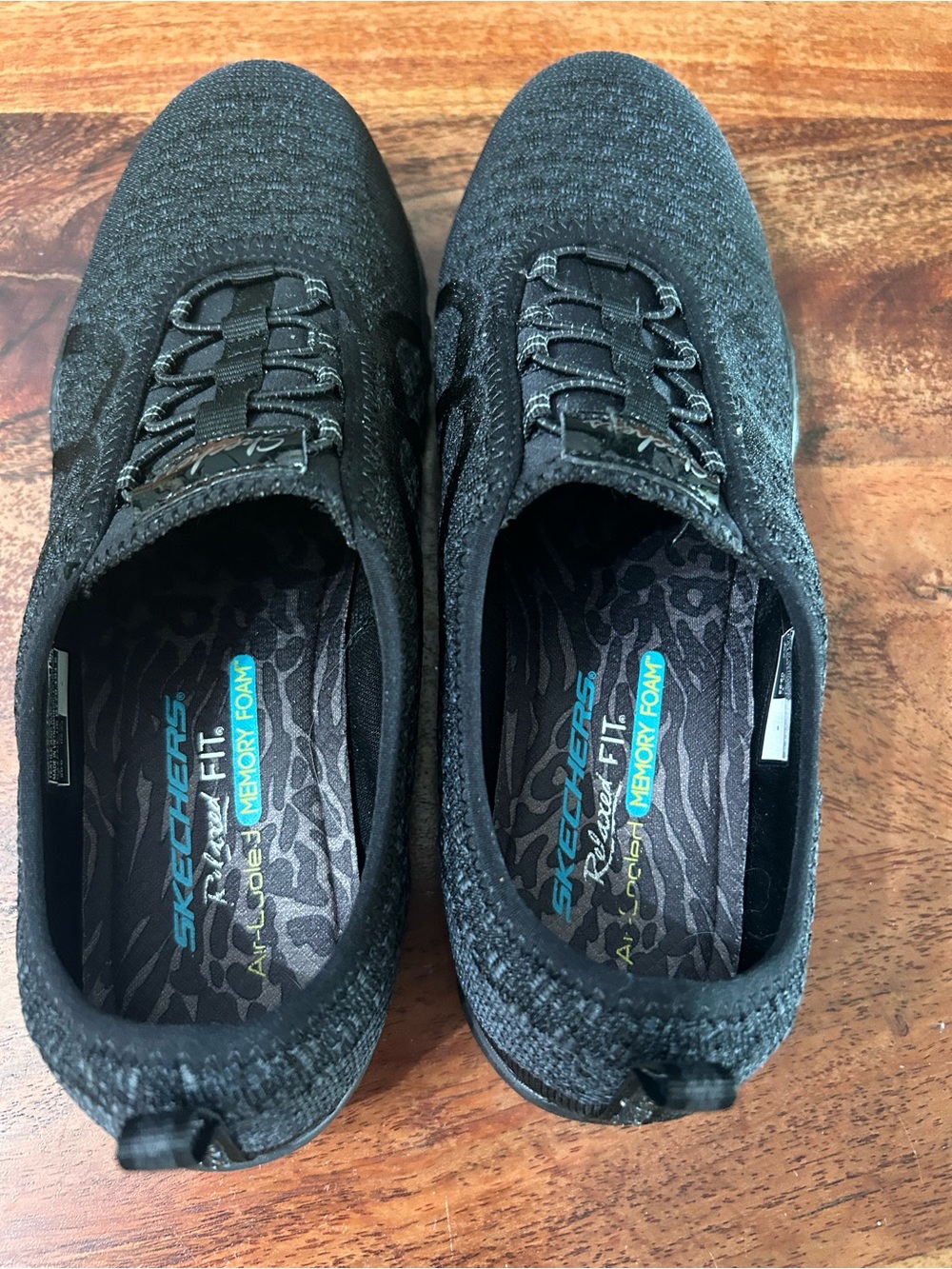 Skechers Women’s Black Relaxed-Fit Memory Foam Slip-On Shoes